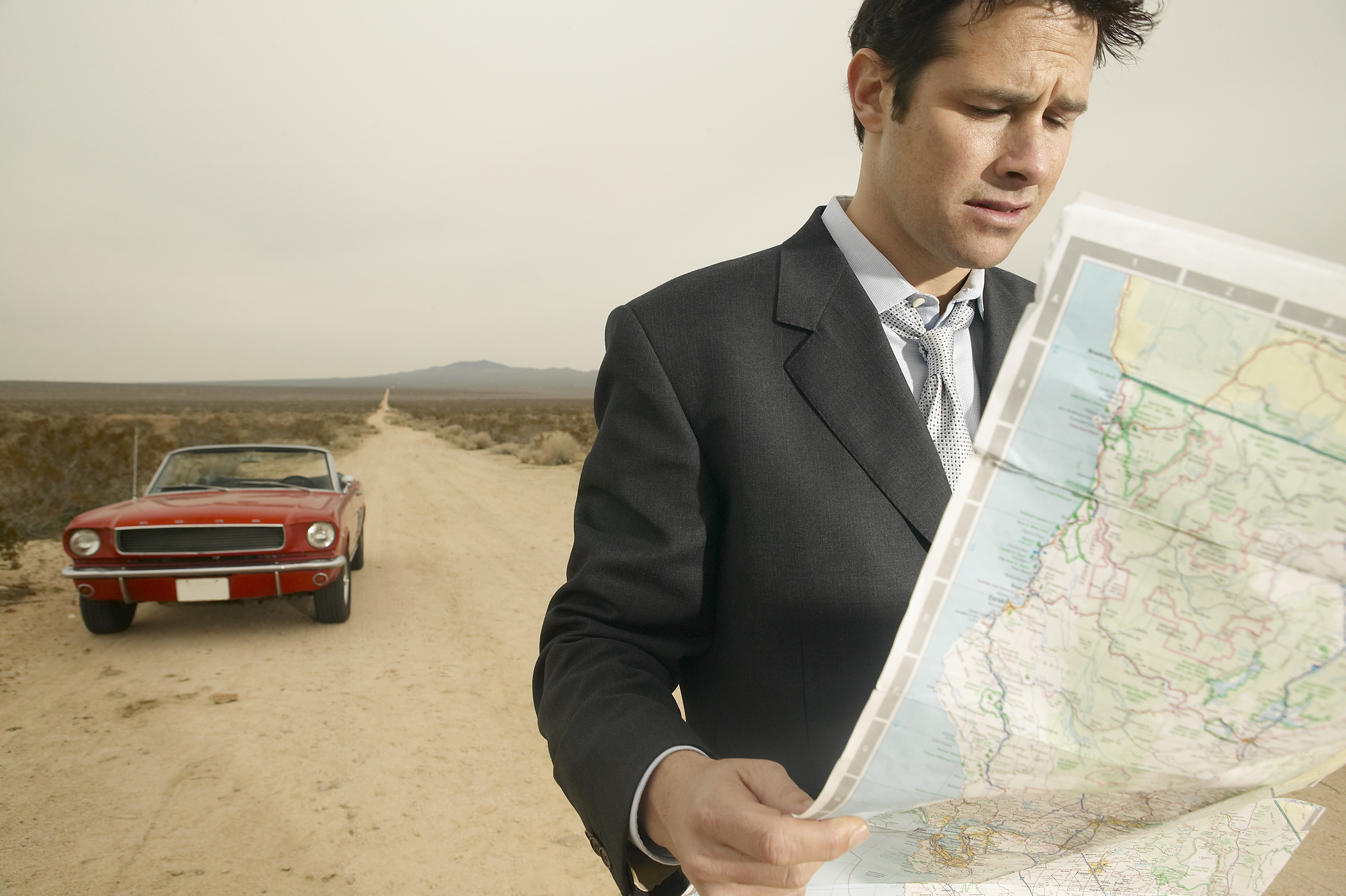 lost man with map and car